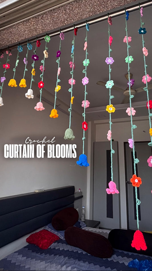 Crochet curtain of blooms